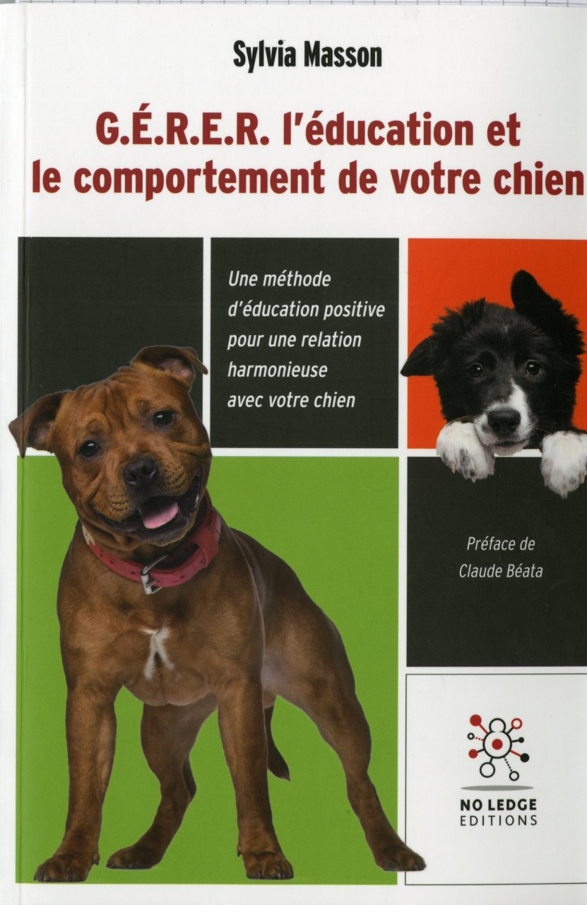 Première couverture du livre "Gérer l'éducation et le comportement de votre chien" de Sylvia Masson avec un staffie qui regarde le lecteur